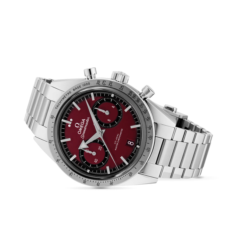 The OMEGA Speedmaster 57 is a stainless steel wristwatch with a red dial, black subdials, tachymeter bezel, and Master Chronometer certification.