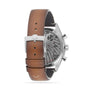 The back view of the OMEGA Speedmaster 57 with a brown leather strap reveals its Master Chronometer certification and the detailed 9906 calibre movement through a transparent case back.