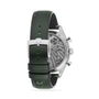 The OMEGA Speedmaster 57 is displayed from the back, showcasing its green leather strap, stainless steel case, transparent case back, and visible Master Chronometer mechanical movement.
