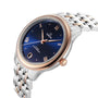 The OMEGA De Ville Prestige wristwatch features stainless steel and rose gold, a PVD blue dial with date display, Roman numeral hour markers, the OMEGA logo, and is powered by the Master Co-Axial 8800 movement.