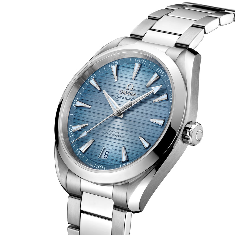 The OMEGA Seamaster Aqua Terra 150M features a blue textured dial, silver markers and hands, date window at 6 o’clock, and a stainless steel link bracelet—elegantly reflecting the brand’s maritime heritage.
