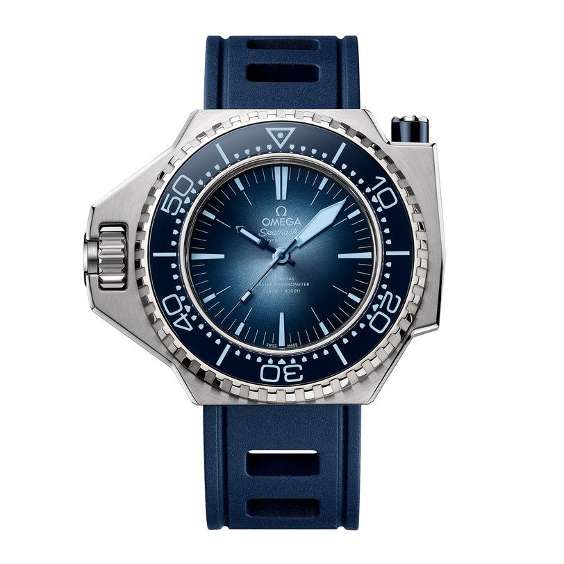OMEGA Seamaster Ploprof 1200M Summer Blue dive watch with a blue gradient dial, large O-MEGASTEEL case, blue rubber strap, and distinctive bezel with crown guard.