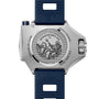 Back view of the OMEGA Seamaster Ploprof 1200M Summer Blue dive watch, featuring an engraved caseback with a seahorse motif, Co-Axial Master Chronometer details, and a blue rubber strap.