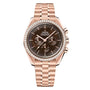 The OMEGA Speedmaster Moonwatch Professional in 18K Sedna Gold features a brown dial, three subdials, diamond bezel, metal link bracelet, and is powered by the Co-Axial Master Chronometer Calibre 3861.