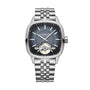 The Raymond Weil Freelancer Calibre RW1212 Automatic features a robust silver case, blue dial with silver hour markers, visible tourbillon, metal link band, and mechanical movement.