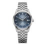 The Raymond Weil Freelancer Automatic Blue Dial wristwatch features a sunray blue dial, silver hour markers, date display at 3 o’clock, and a sleek metal link bracelet.