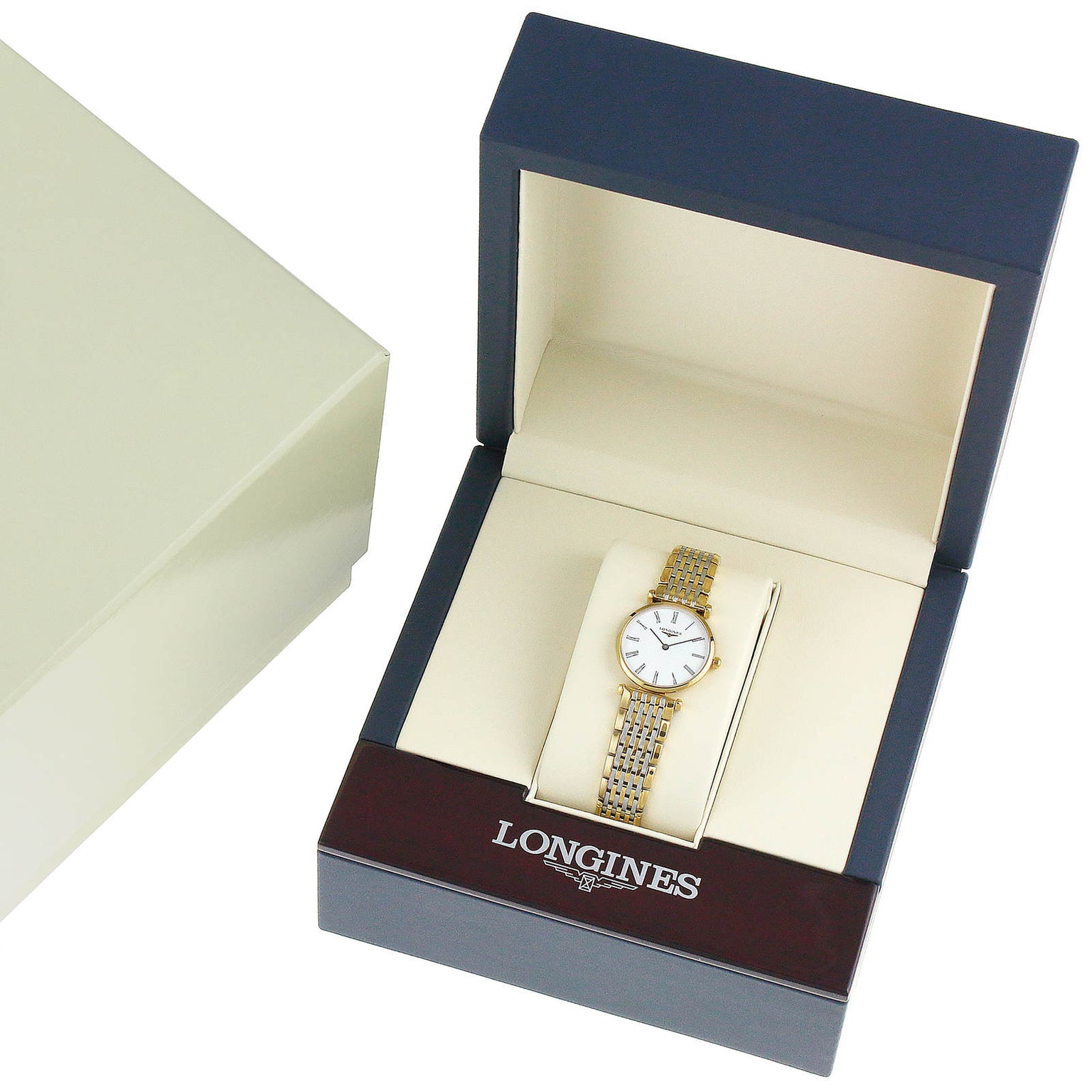 A La Grande Classique de LONGINES gold wristwatch with a white face by Longines, displayed in an open presentation box.