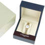 A La Grande Classique de LONGINES gold wristwatch with a white face by Longines, displayed in an open presentation box.