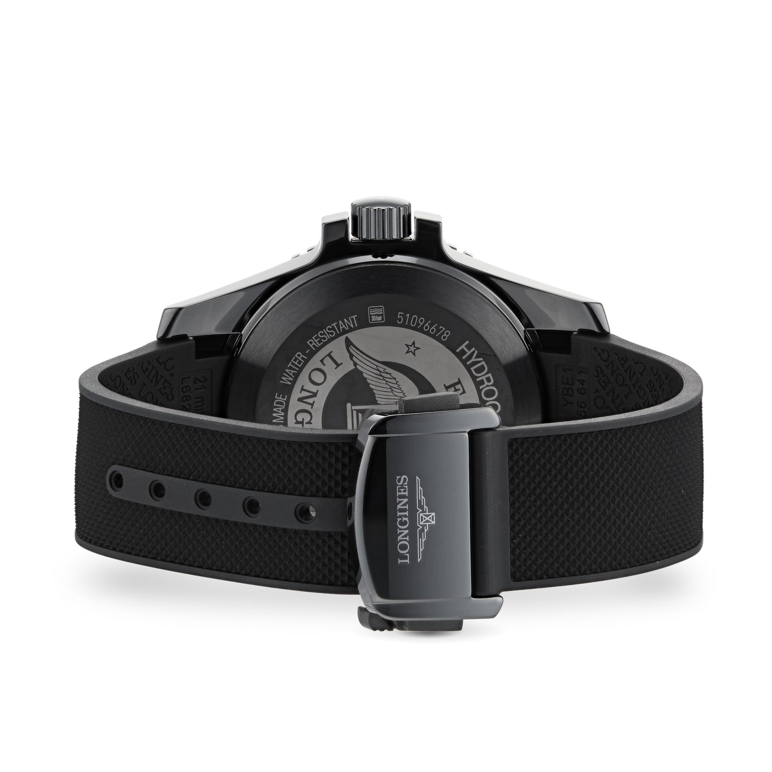 The image displays the back view of the Longines HydroConquest, highlighting its black rubber strap and a case back engraved with the brand logo and details of its automatic movement.