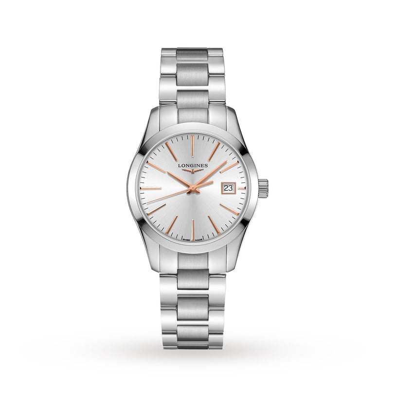 A Longines Conquest Classic wristwatch featuring a stainless steel case, metal band, white dial with gold hour markers and hands, plus a date window at 3 o’clock.