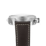 Side view of the Longines Spirit Chronograph, featuring a silver case, crown, and dark brown leather strap with white stitching, powered by the precise L688.4 calibre movement.