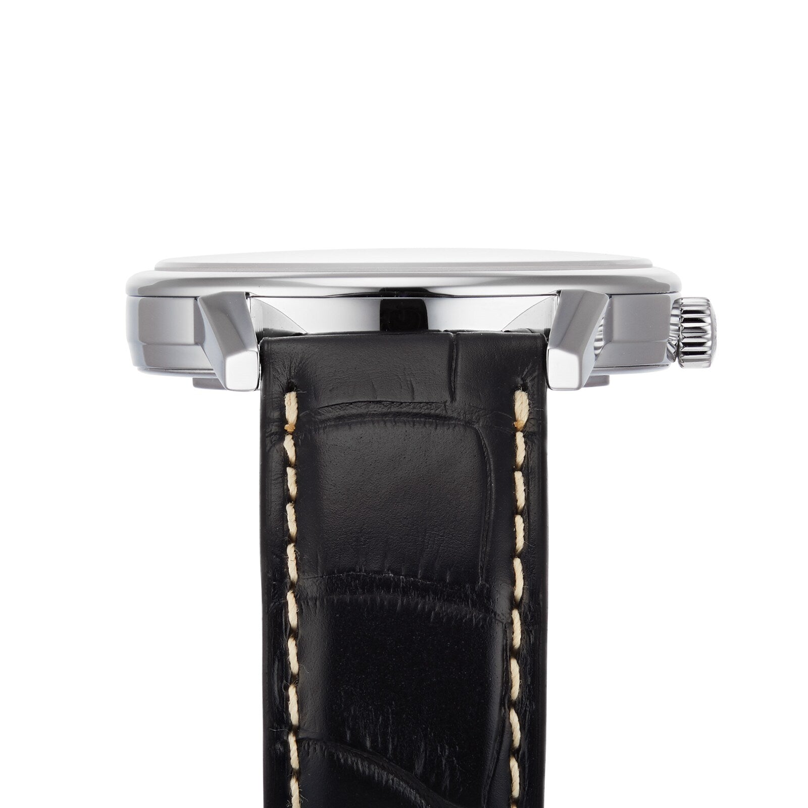 Side view of the Longines Flagship Heritage wristwatch with a black leather strap featuring white stitching, Swiss Super-LumiNova accents, and a silver case with crown on the right side.