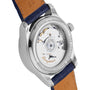 Close-up of the Longines Master Collection Moonphase wristwatch displays its automatic movement through a transparent case back, blue leather strap, engraved branding, moonphase display, and diamond indexes for refined elegance.