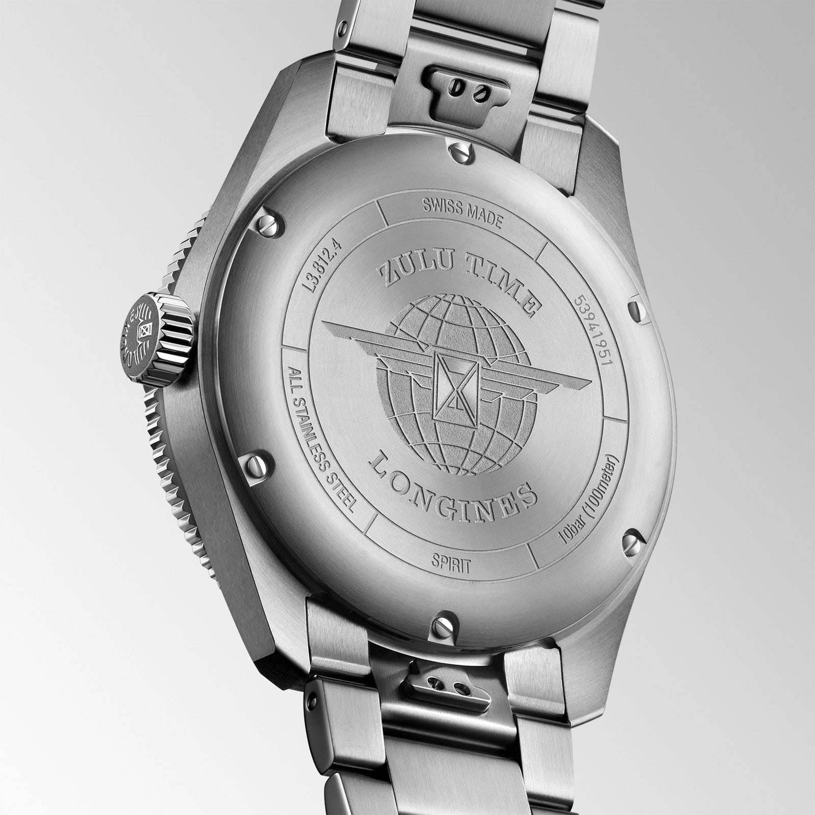 Close-up of the Longines Spirit Zulu Times stainless steel case back with engraved branding, a globe design, and technical details.