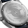Close-up of the Longines Spirit Zulu Time’s back shows engraved text, a winged globe logo, and specifications, all enhanced by its stainless steel case and blue ceramic bezel.