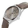 The Longines Master Collection watch features automatic movement, diamond hour markers, a date window at 3 o’clock, and a brown leather strap.
