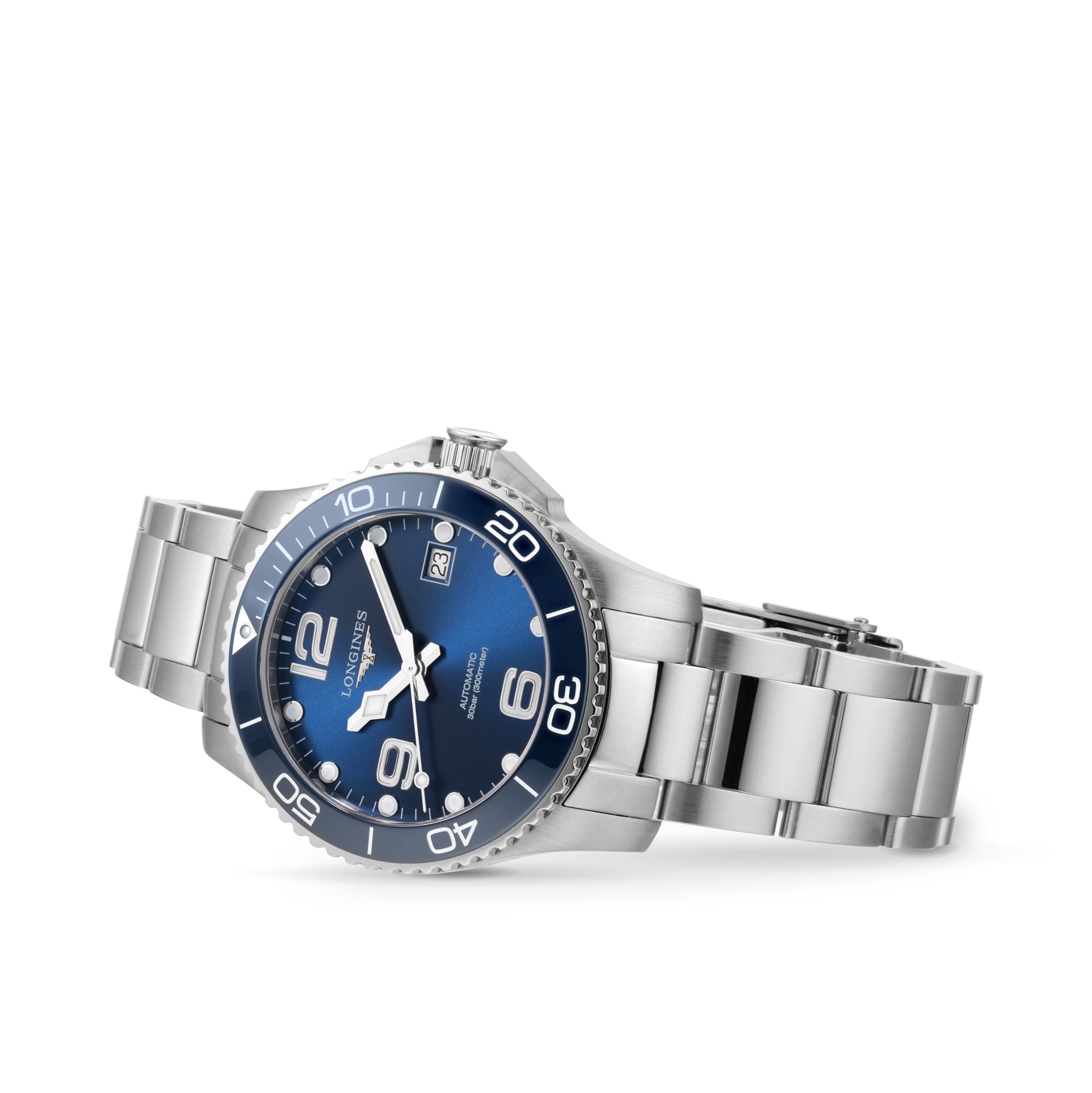 The Longines HydroConquest, a stainless steel wristwatch with a sunray blue dial, bold white numerals, and a rotating bezel, is shown at an angle on a white background.