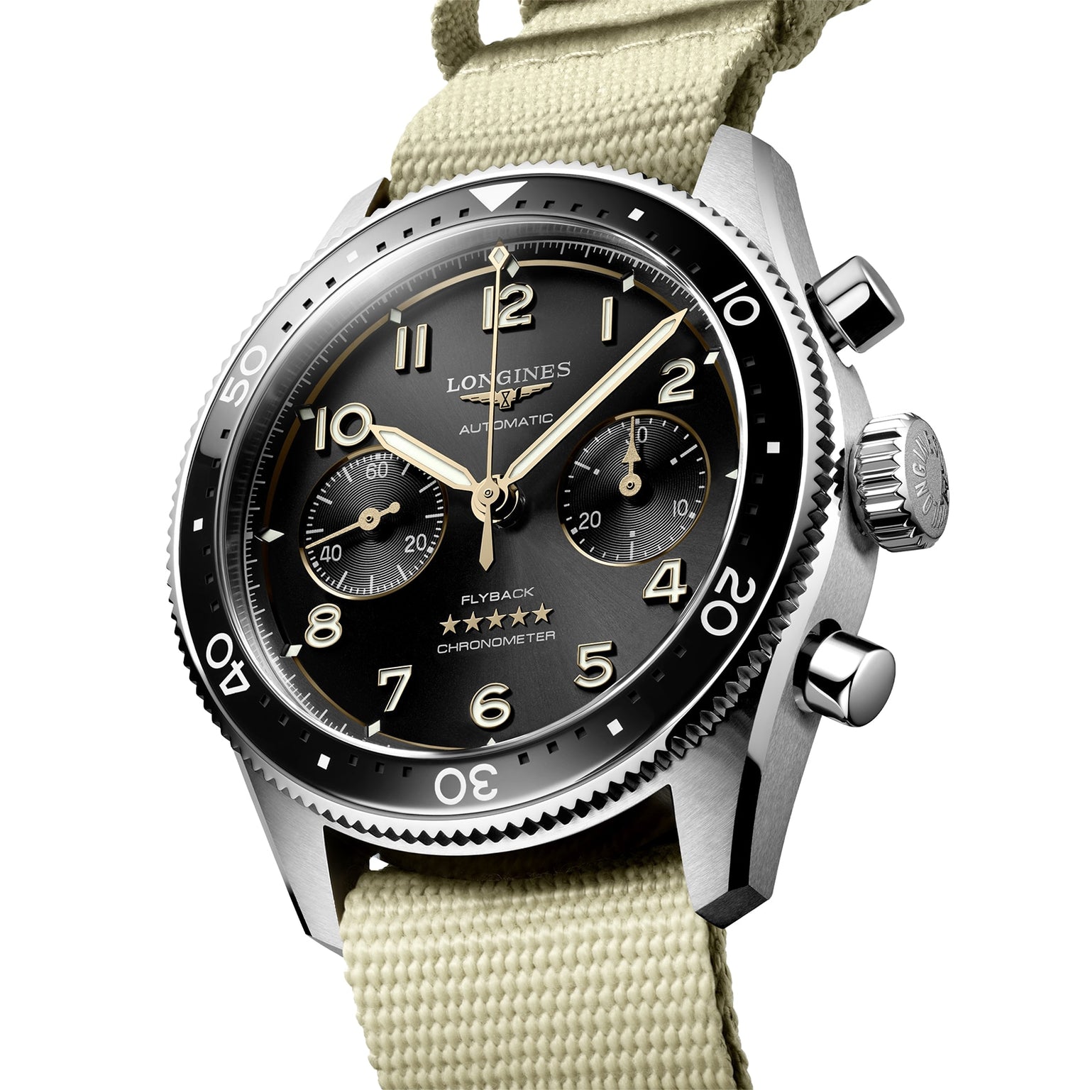 A close-up of the Longines Spirit Flyback automatic chronograph, featuring a black dial, beige numerals, light khaki fabric strap, and powered by the precise automatic calibre L791.