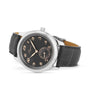 A Longines Master Collection silver wristwatch with a black face, gold numerals, L893 automatic movement, subdial, and black leather strap is displayed at a slight angle.