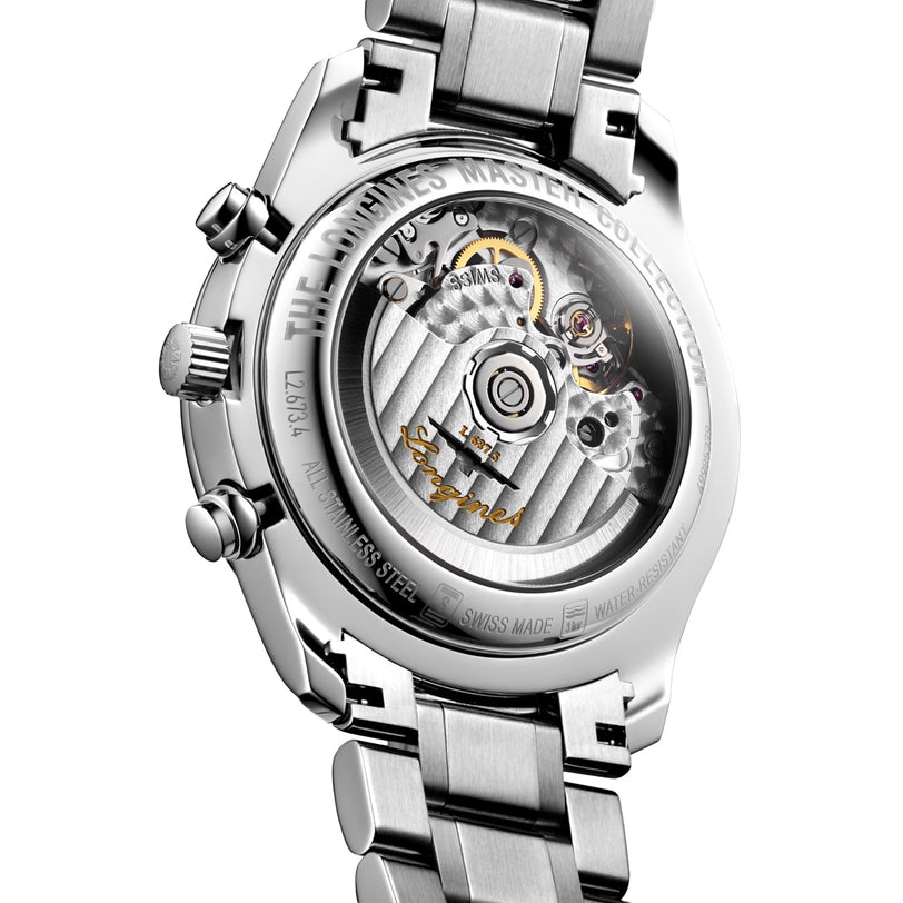 Close-up of the transparent case back on the Longines Master Collection Chrono Moonphase, highlighting its mechanical movement and engraved stainless steel case and bracelet—an elegant timepiece from Longines.