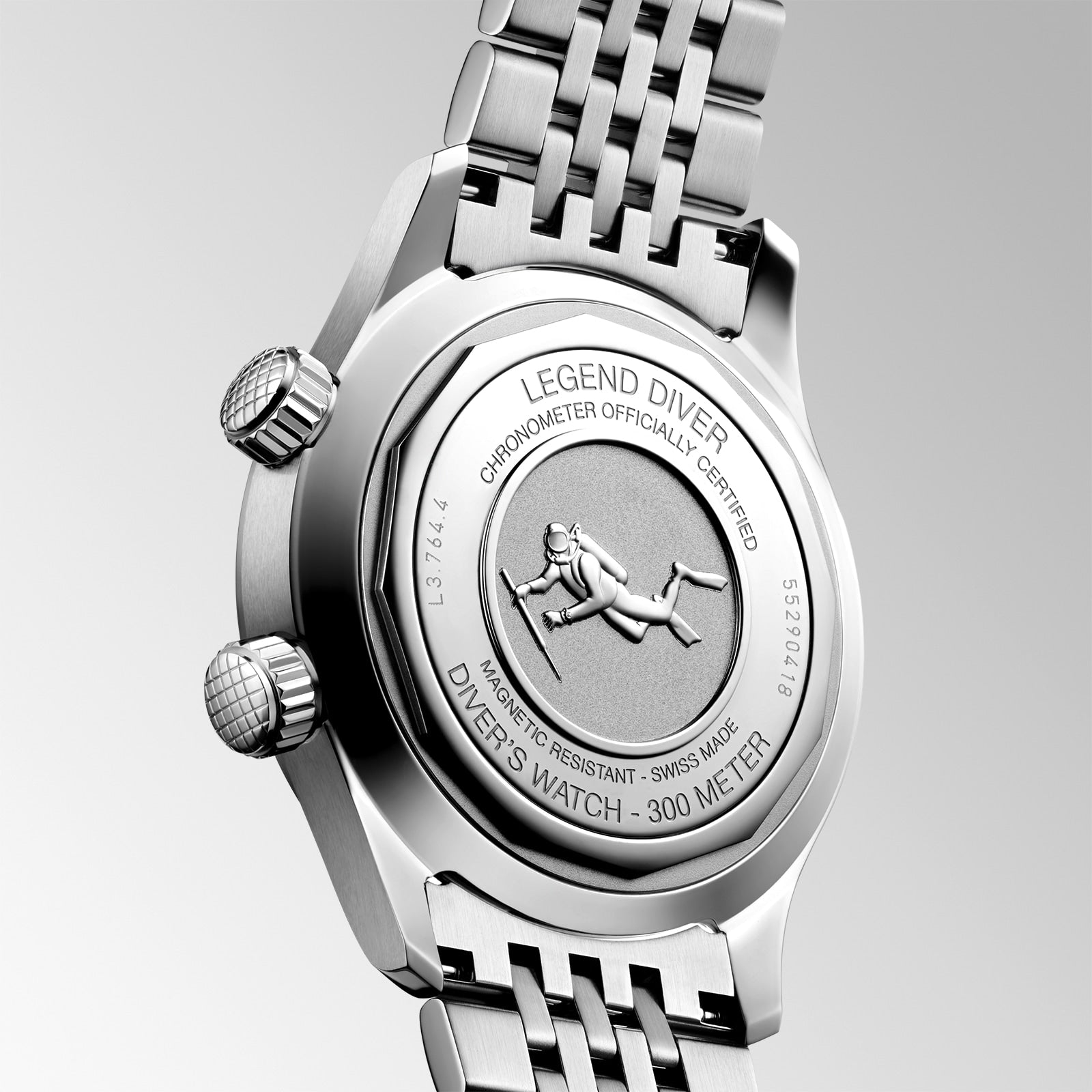 Close-up of the back of the Longines Legend Diver watch, featuring an engraved diver figure along with text highlighting its water resistance and automatic movement credentials.