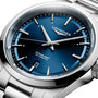 Close-up of the Longines Conquest, featuring a sunray blue dial, silver markers and hands, L888 automatic movement, date at 6 o’clock, and a stainless steel bracelet.