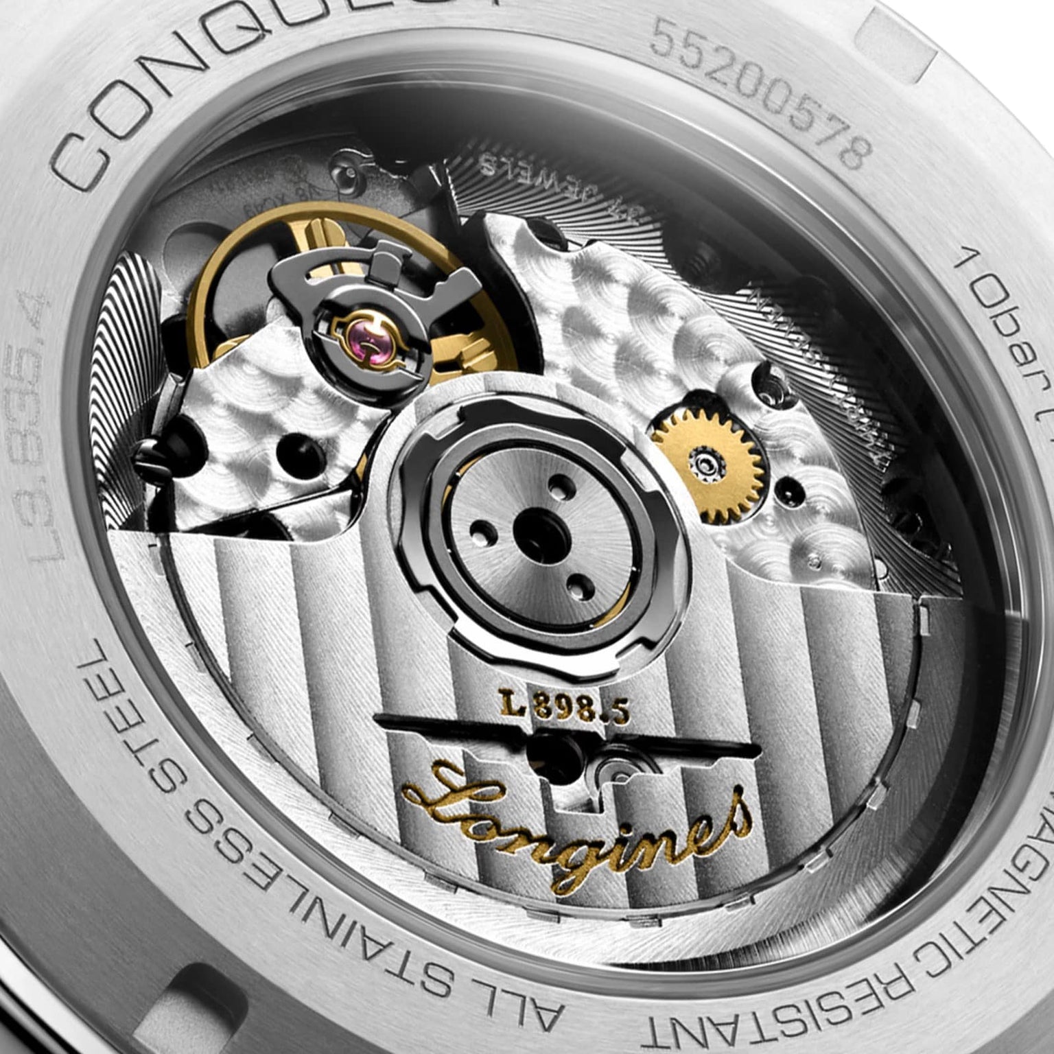 A close-up of the Longines Conquest Chronograph shows its self-winding movement, with gears, rotor, and engraved branding visible through the transparent caseback.