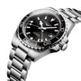The Longines HydroConquest GMT, a stainless steel diving watch with a black dial, date display, and rotating bezel, is shown at an angle on a white background.