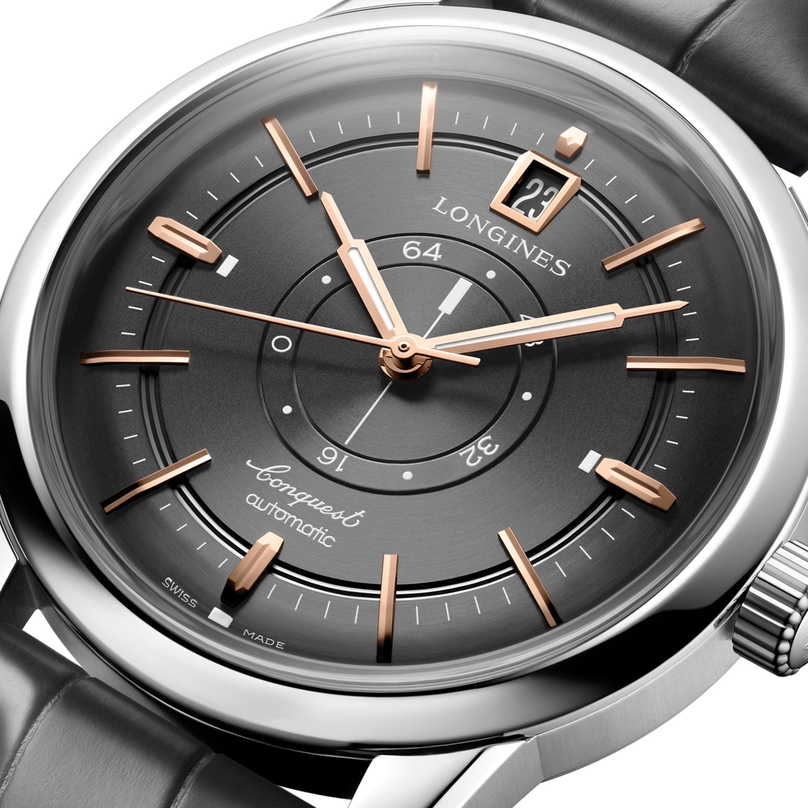Close-up of the Longines Conquest Heritage Central Power Reserve, featuring a dark dial, gold markers, date at 12 o’clock, and a silver case with leather strap. This automatic watch combines precision timekeeping with classic elegance.