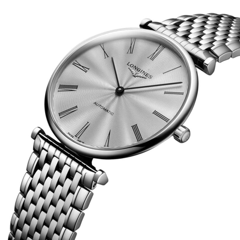 The Longines La Grande Classique de LONGINES wristwatch features a silver metal bracelet, Roman numeral markers, and a minimalist round dial, offering timeless elegance.