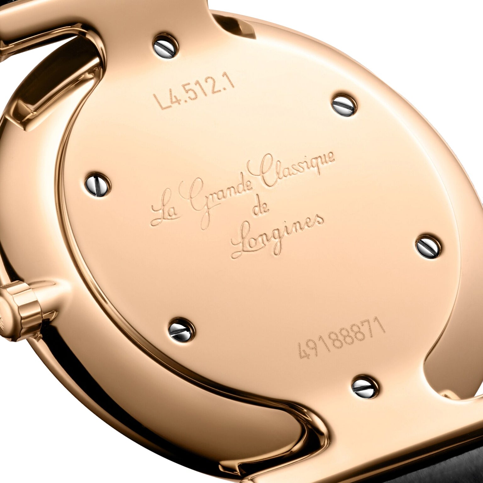 Close-up of the gold case back on the Longines La Grande Classique de LONGINES, engraved with model number L4.512.1 and serial number 49188871.