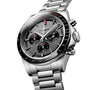 The Longines Conquest Chrono Ski Edition is shown at an angle, featuring a silver stainless steel bracelet, black dial with three sub-dials, and tachymeter scale—highlighting the Swiss watchs accuracy and elegant design.