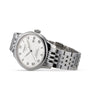 The Tissot Le Locle Powermatic 80 silver wristwatch features a white dial with Roman numerals, date display, and metal link band, presented on a white background. Inspired by the Swiss Jura Mountains.