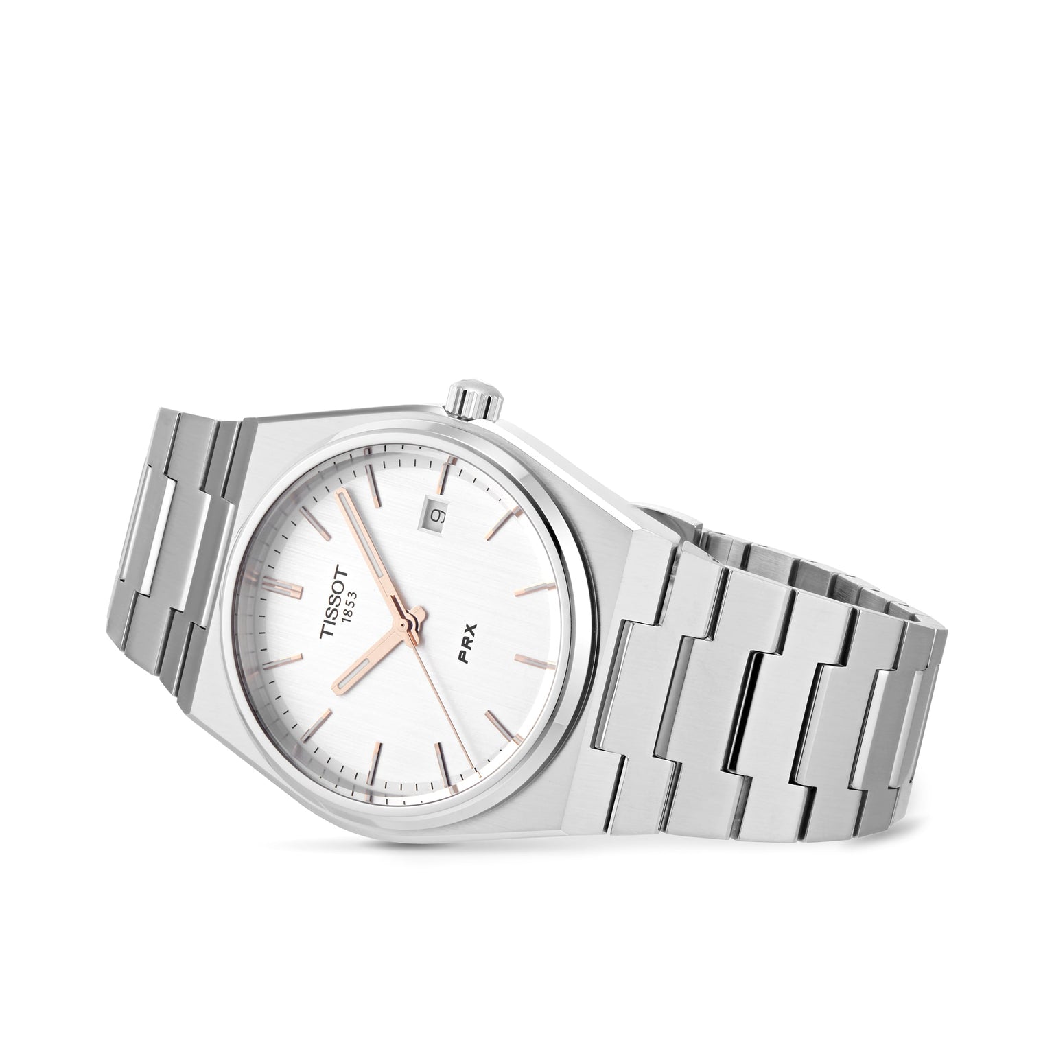 The Tissot PRX features a silver stainless steel band, white dial, date at 3 o’clock, and minimalist markers, highlighting its 1970s-inspired design and Swiss quartz movement against a crisp white background.