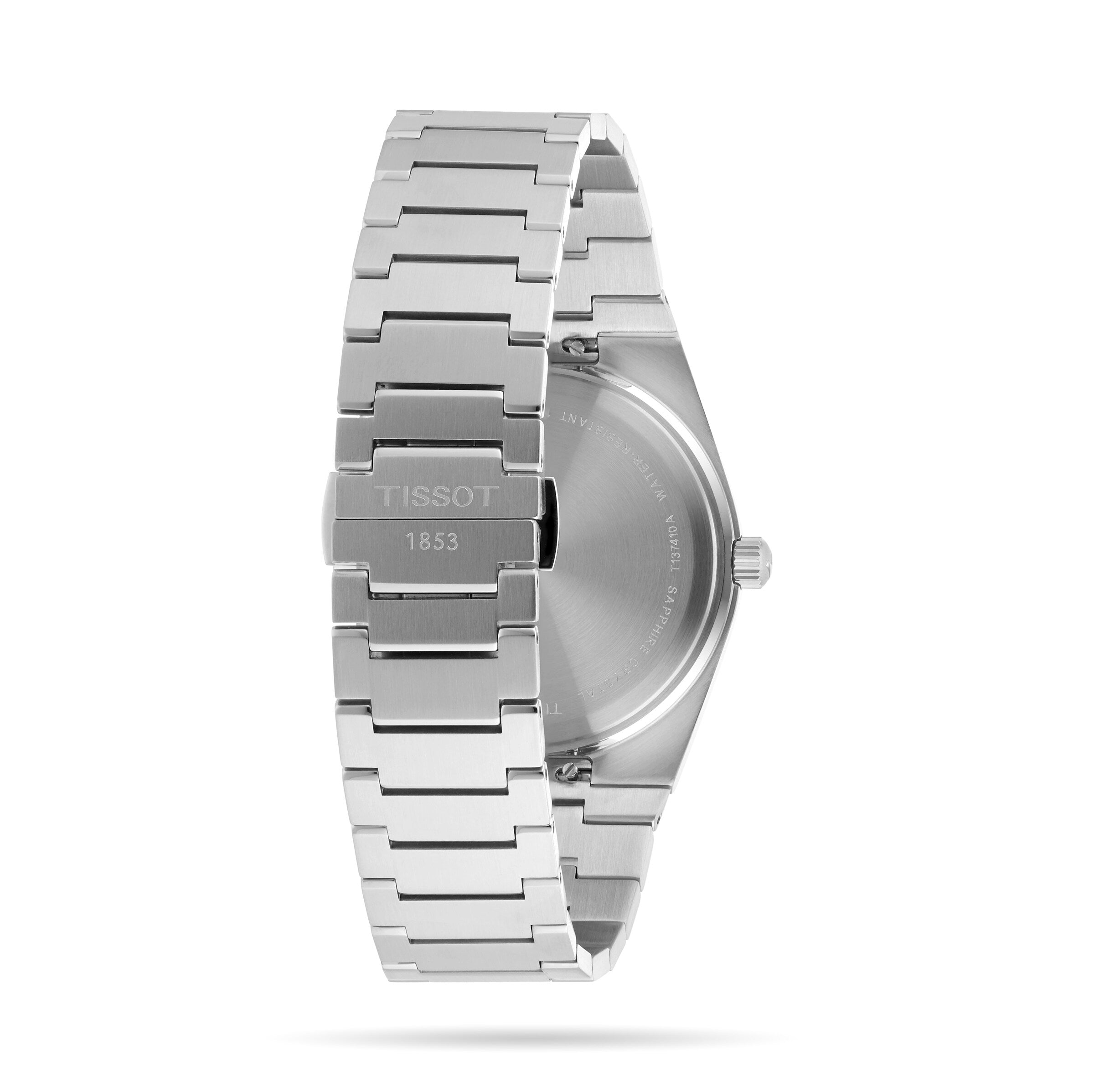 Back view of the Tissot PRX, highlighting its engraved clasp and metal bracelet—showcasing Swiss quartz movement and a refined 1970s-inspired design.