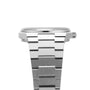 A close-up side view of the Tissot PRX wristwatch with a stainless steel bracelet, showcasing its 1970s-inspired design, case edge, crown, and band links against a white background.