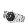 A Tissot PRX wristwatch featuring a stainless steel case, Swiss quartz movement, black dial, date at 3 o’clock, and silver-tone hands and markers is displayed on a white background.