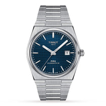 The Tissot PRX Powermatic 80 is a luxurious stainless steel wristwatch featuring a blue textured dial, silver hour markers, date window at 3 o’clock, and bracelet band. It runs on the precise Powermatic 80 movement for reliable performance.