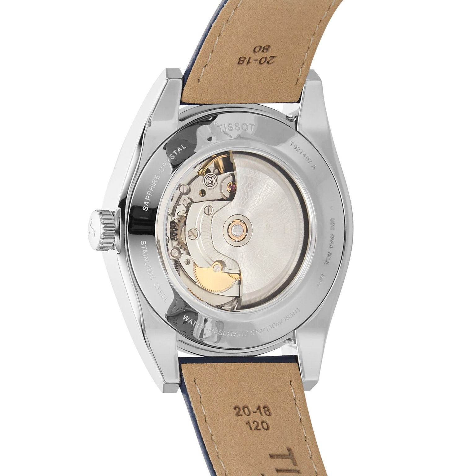 The image displays the back of the Tissot Gentleman Powermatic 80 Silicium Solid 18k Bezel, showcasing its transparent case back, elegant movement, and classic tan leather strap with visible stitching and signature craftsmanship.