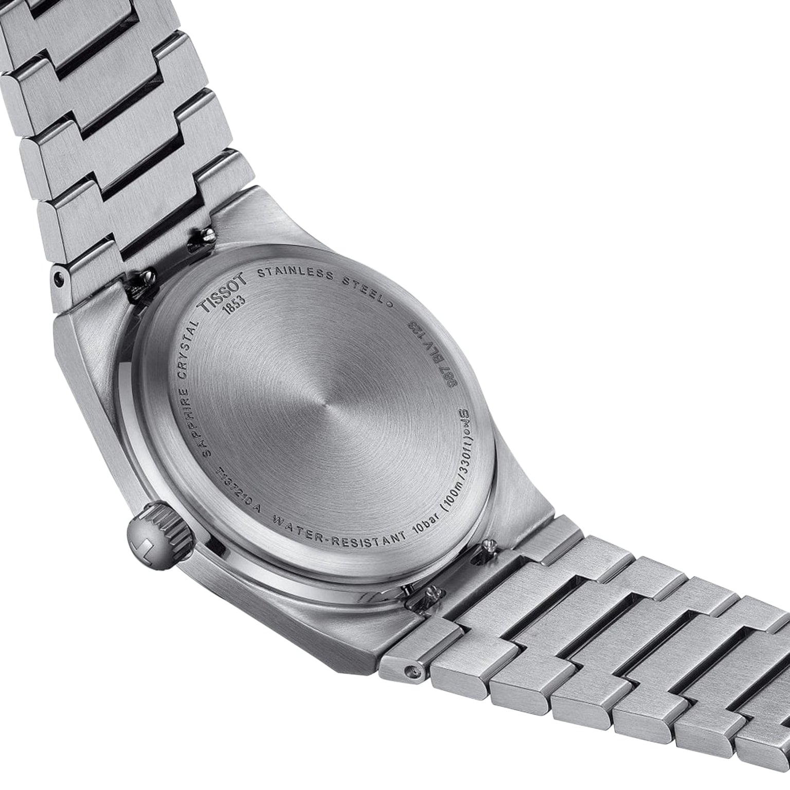 Back view of the Tissot PRX showcasing its engraved case back, bracelet, and crown, featuring water resistance details and quality materials—spotlighting Swiss quartz movement and a 1970s-inspired design.