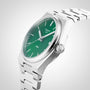 The Tissot PRX wristwatch pairs a stainless steel case, green dial, silver markers, and metal bracelet with precise Swiss quartz movement—a standout in the Tissot collection.