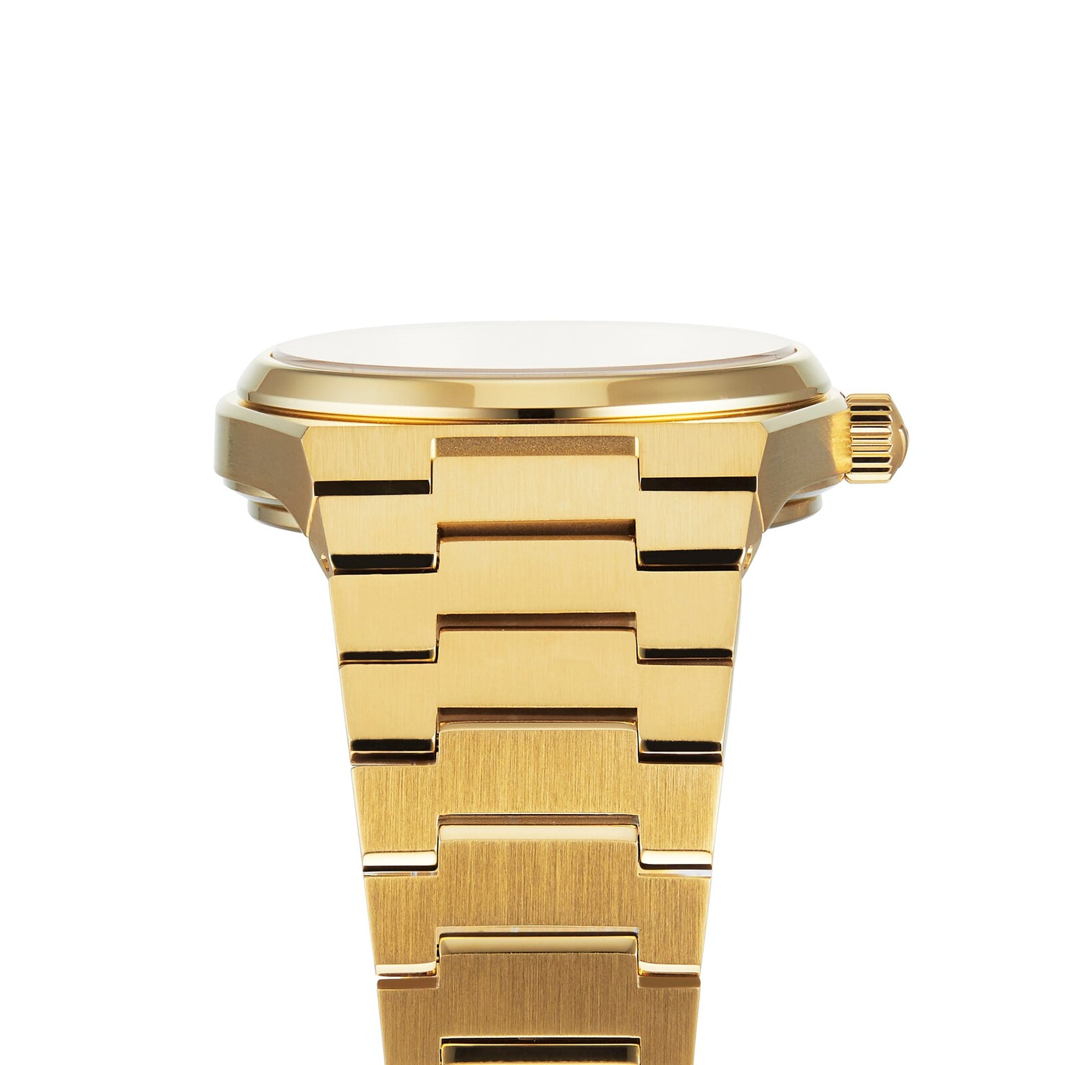 The Tissot PRX gold wristwatch features a metal link bracelet and showcases its crown and slim case from the side—an elegant option for luxury watch enthusiasts.