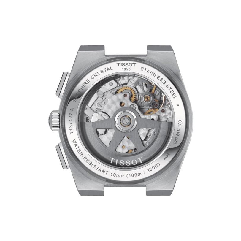 Back view of the Tissot PRX Automatic Chronograph, showcasing its 1970s-inspired stainless steel case and visible internal gears through a transparent sapphire crystal.
