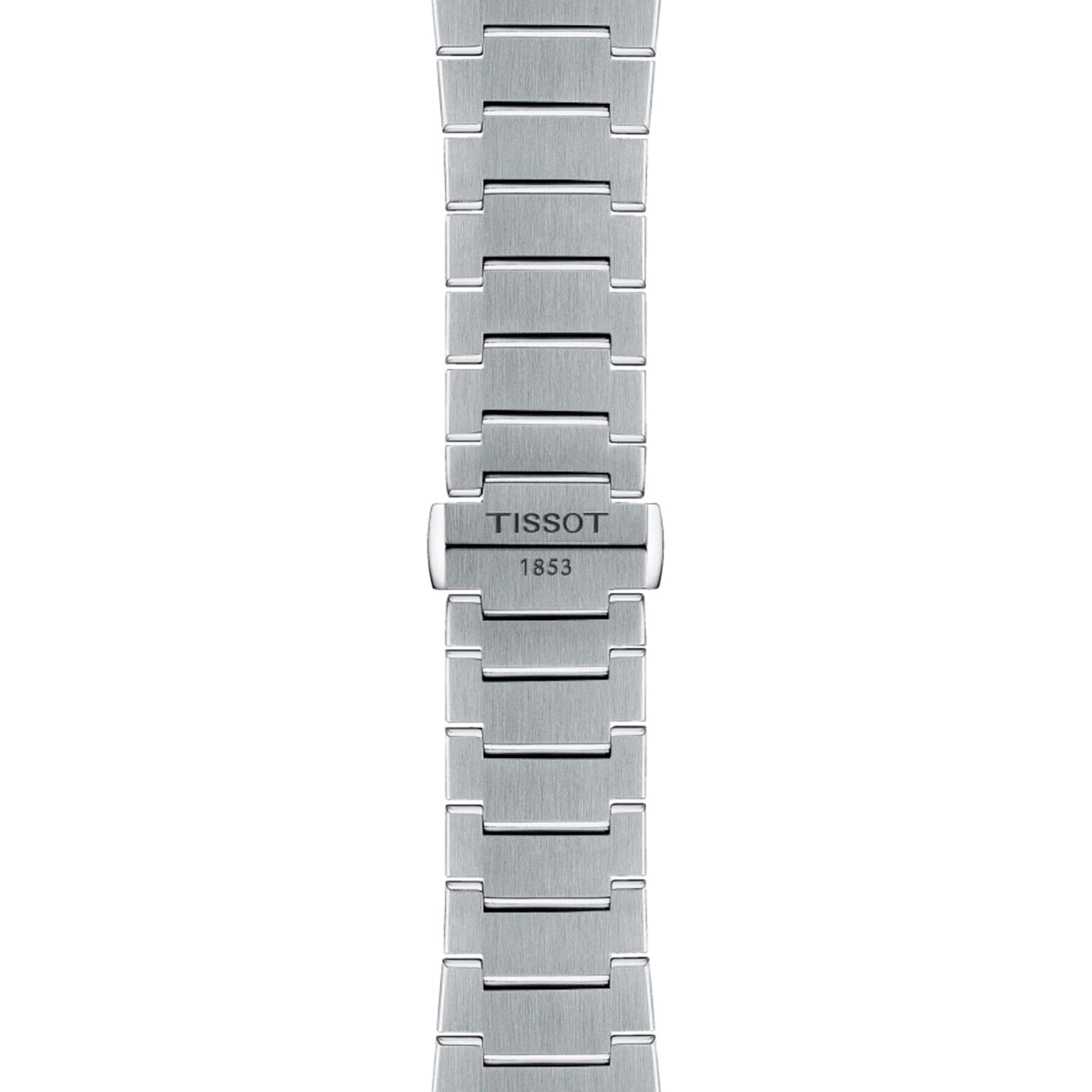 Close-up view of the Tissot PRX Automatic Chronographs silver brushed metal bracelet, showcasing the Tissot logo and 1853 engraved on the clasp—a refined touch echoing its stainless steel case.