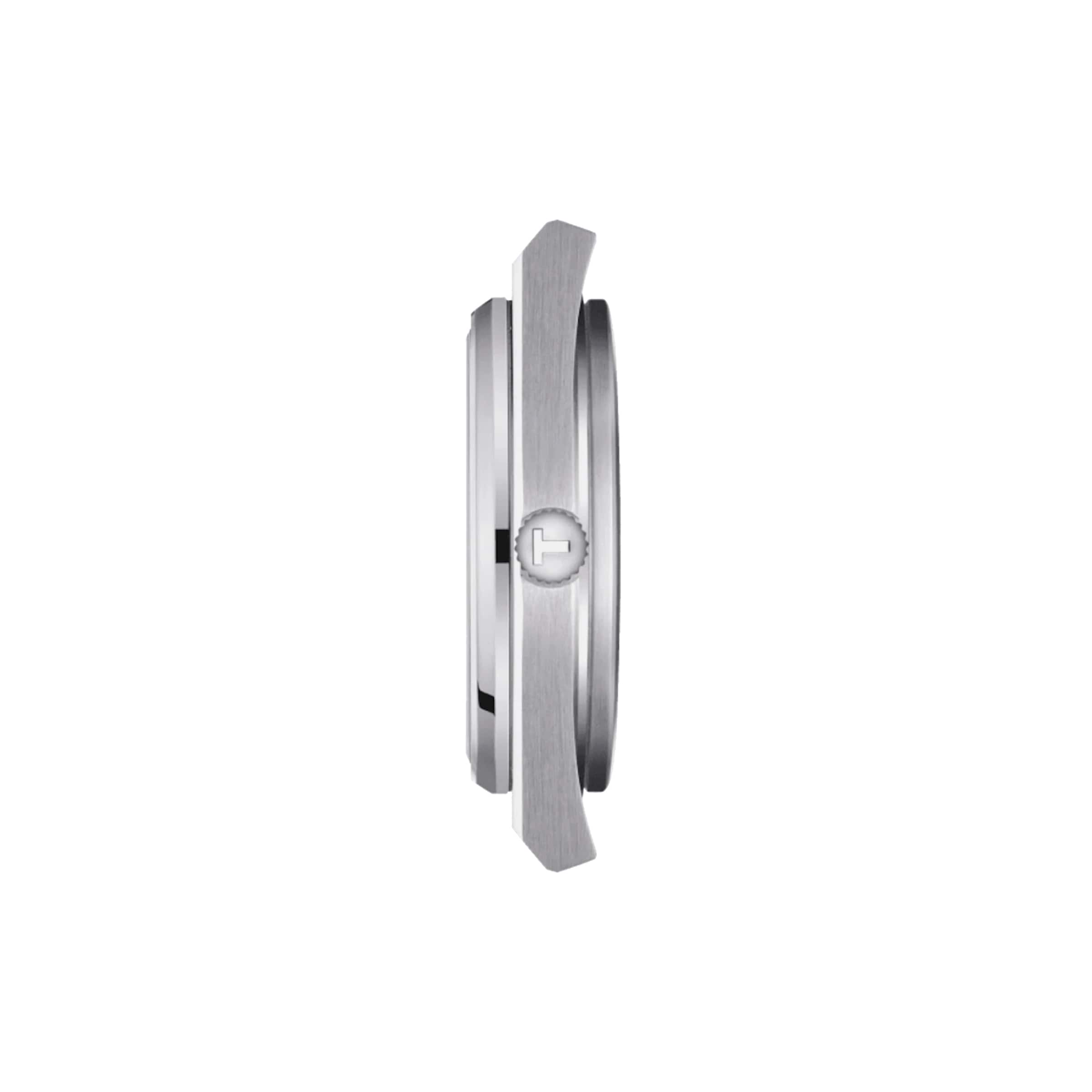 Side view of the Tissot PRX wristwatch in silver, showcasing its slim case and engraved logo on the crown against a white background, emphasizing the watch’s sleek design.