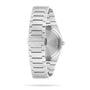 The image displays the back view of the Tissot PRX, featuring a stainless steel bracelet and a clasp engraved with TISSOT 1853, emphasizing the watchs refined case back and craftsmanship.