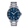 The Tissot Seastar 1000 is a stainless steel divers watch with a blue dial, silver hands, white hour markers, and date display at 6 o’clock. It’s water resistant for daily wear and underwater adventures.