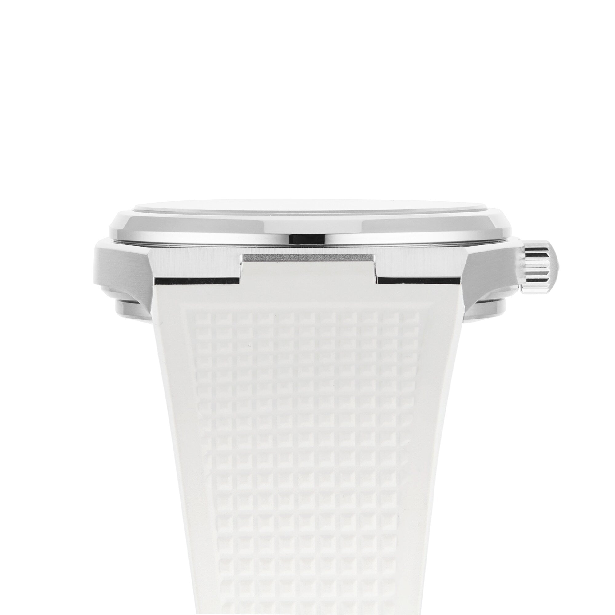Side view of the 40mm Tissot PRX watch with vintage style, featuring a silver case, white textured strap, and visible crown, set against a plain white background.
