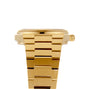 Side view of the Tissot PRX Powermatic 80 in gold, showcasing a metal link bracelet, right-side crown, and the innovative Nivachron hairspring.