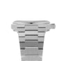 Close-up side view of the Tissot PRX watch featuring a brushed metal bracelet, visible crown on the right, and an eye-catching mint green dial.
